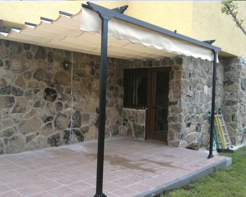 Toldo corredero con porteria